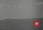 Image of planes on deck Pacific Ocean, 1945, second 17 stock footage video 65675074717