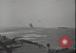 Image of planes on deck Pacific Ocean, 1945, second 26 stock footage video 65675074717
