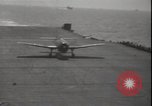 Image of planes on deck Pacific Ocean, 1945, second 31 stock footage video 65675074717