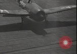 Image of planes on deck Pacific Ocean, 1945, second 34 stock footage video 65675074717