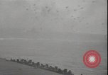 Image of planes on deck Pacific Ocean, 1945, second 58 stock footage video 65675074717