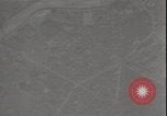 Image of bomb bursts Tokyo Japan, 1944, second 27 stock footage video 65675074726