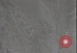 Image of bomb bursts Tokyo Japan, 1944, second 54 stock footage video 65675074726