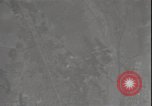 Image of bomb bursts Tokyo Japan, 1944, second 56 stock footage video 65675074726