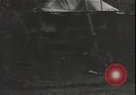 Image of United States army quonset hut Guadalcanal Solomon Islands, 1942, second 33 stock footage video 65675074731