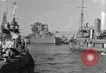 Image of tug boats moving the USS West Virginia after initial repairs in Pearl  Oahu Hawaii USA, 1942, second 1 stock footage video 65675074763