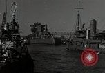 Image of tug boats moving the USS West Virginia after initial repairs in Pearl  Oahu Hawaii USA, 1942, second 3 stock footage video 65675074763