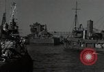 Image of tug boats moving the USS West Virginia after initial repairs in Pearl  Oahu Hawaii USA, 1942, second 5 stock footage video 65675074763