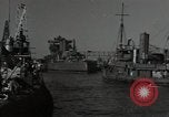 Image of tug boats moving the USS West Virginia after initial repairs in Pearl  Oahu Hawaii USA, 1942, second 6 stock footage video 65675074763