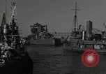 Image of tug boats moving the USS West Virginia after initial repairs in Pearl  Oahu Hawaii USA, 1942, second 7 stock footage video 65675074763