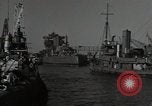 Image of tug boats moving the USS West Virginia after initial repairs in Pearl  Oahu Hawaii USA, 1942, second 8 stock footage video 65675074763