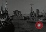 Image of tug boats moving the USS West Virginia after initial repairs in Pearl  Oahu Hawaii USA, 1942, second 10 stock footage video 65675074763