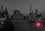 Image of tug boats moving the USS West Virginia after initial repairs in Pearl  Oahu Hawaii USA, 1942, second 11 stock footage video 65675074763