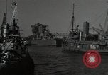 Image of tug boats moving the USS West Virginia after initial repairs in Pearl  Oahu Hawaii USA, 1942, second 12 stock footage video 65675074763