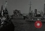 Image of tug boats moving the USS West Virginia after initial repairs in Pearl  Oahu Hawaii USA, 1942, second 13 stock footage video 65675074763