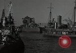Image of tug boats moving the USS West Virginia after initial repairs in Pearl  Oahu Hawaii USA, 1942, second 14 stock footage video 65675074763