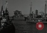 Image of tug boats moving the USS West Virginia after initial repairs in Pearl  Oahu Hawaii USA, 1942, second 15 stock footage video 65675074763