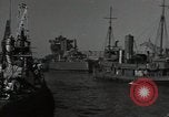 Image of tug boats moving the USS West Virginia after initial repairs in Pearl  Oahu Hawaii USA, 1942, second 16 stock footage video 65675074763