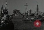 Image of tug boats moving the USS West Virginia after initial repairs in Pearl  Oahu Hawaii USA, 1942, second 26 stock footage video 65675074763