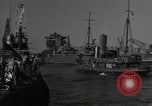 Image of tug boats moving the USS West Virginia after initial repairs in Pearl  Oahu Hawaii USA, 1942, second 28 stock footage video 65675074763