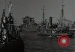 Image of tug boats moving the USS West Virginia after initial repairs in Pearl  Oahu Hawaii USA, 1942, second 29 stock footage video 65675074763