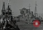 Image of tug boats moving the USS West Virginia after initial repairs in Pearl  Oahu Hawaii USA, 1942, second 32 stock footage video 65675074763