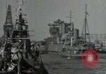 Image of tug boats moving the USS West Virginia after initial repairs in Pearl  Oahu Hawaii USA, 1942, second 36 stock footage video 65675074763