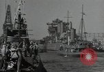 Image of tug boats moving the USS West Virginia after initial repairs in Pearl  Oahu Hawaii USA, 1942, second 39 stock footage video 65675074763