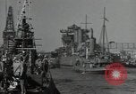 Image of tug boats moving the USS West Virginia after initial repairs in Pearl  Oahu Hawaii USA, 1942, second 43 stock footage video 65675074763