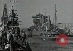 Image of tug boats moving the USS West Virginia after initial repairs in Pearl  Oahu Hawaii USA, 1942, second 44 stock footage video 65675074763