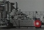 Image of tug boats moving the USS West Virginia after initial repairs in Pearl  Oahu Hawaii USA, 1942, second 48 stock footage video 65675074763