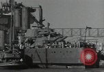 Image of tug boats moving the USS West Virginia after initial repairs in Pearl  Oahu Hawaii USA, 1942, second 52 stock footage video 65675074763