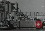 Image of tug boats moving the USS West Virginia after initial repairs in Pearl  Oahu Hawaii USA, 1942, second 59 stock footage video 65675074763