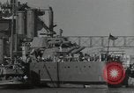 Image of tug boats moving the USS West Virginia after initial repairs in Pearl  Oahu Hawaii USA, 1942, second 60 stock footage video 65675074763