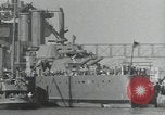 Image of tug boats moving the USS West Virginia after initial repairs in Pearl  Oahu Hawaii USA, 1942, second 61 stock footage video 65675074763