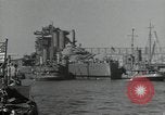 Image of tug boats moving the USS West Virginia after initial repairs in Pearl  Oahu Hawaii USA, 1942, second 62 stock footage video 65675074763
