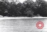 Image of personal camouflage Pacific Theater, 1941, second 25 stock footage video 65675074820