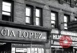 Image of Cuban and Puerto Rican hispanic stores in Harlem 1940 New York United States USA, 1939, second 42 stock footage video 65675074861