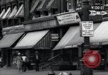 Standbild Harlem street scene in 1939 New York City USA, 1939, aus Sekunde 10 historischem Filmmaterial Videoclip 65675074863