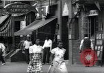 Standbild Harlem street scene in 1939 New York City USA, 1939, aus Sekunde 40 historischem Filmmaterial Videoclip 65675074863