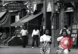 Standbild Harlem street scene in 1939 New York City USA, 1939, aus Sekunde 41 historischem Filmmaterial Videoclip 65675074863