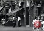 Standbild Harlem street scene in 1939 New York City USA, 1939, aus Sekunde 42 historischem Filmmaterial Videoclip 65675074863