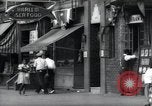 Standbild Harlem street scene in 1939 New York City USA, 1939, aus Sekunde 43 historischem Filmmaterial Videoclip 65675074863