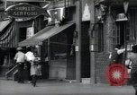 Standbild Harlem street scene in 1939 New York City USA, 1939, aus Sekunde 44 historischem Filmmaterial Videoclip 65675074863