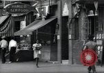 Standbild Harlem street scene in 1939 New York City USA, 1939, aus Sekunde 45 historischem Filmmaterial Videoclip 65675074863