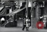 Standbild Harlem street scene in 1939 New York City USA, 1939, aus Sekunde 48 historischem Filmmaterial Videoclip 65675074863