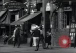 Standbild Harlem street scene in 1939 New York City USA, 1939, aus Sekunde 51 historischem Filmmaterial Videoclip 65675074863
