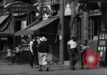 Standbild Harlem street scene in 1939 New York City USA, 1939, aus Sekunde 52 historischem Filmmaterial Videoclip 65675074863