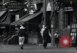 Standbild Harlem street scene in 1939 New York City USA, 1939, aus Sekunde 54 historischem Filmmaterial Videoclip 65675074863