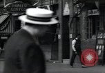 Standbild Harlem street scene in 1939 New York City USA, 1939, aus Sekunde 55 historischem Filmmaterial Videoclip 65675074863